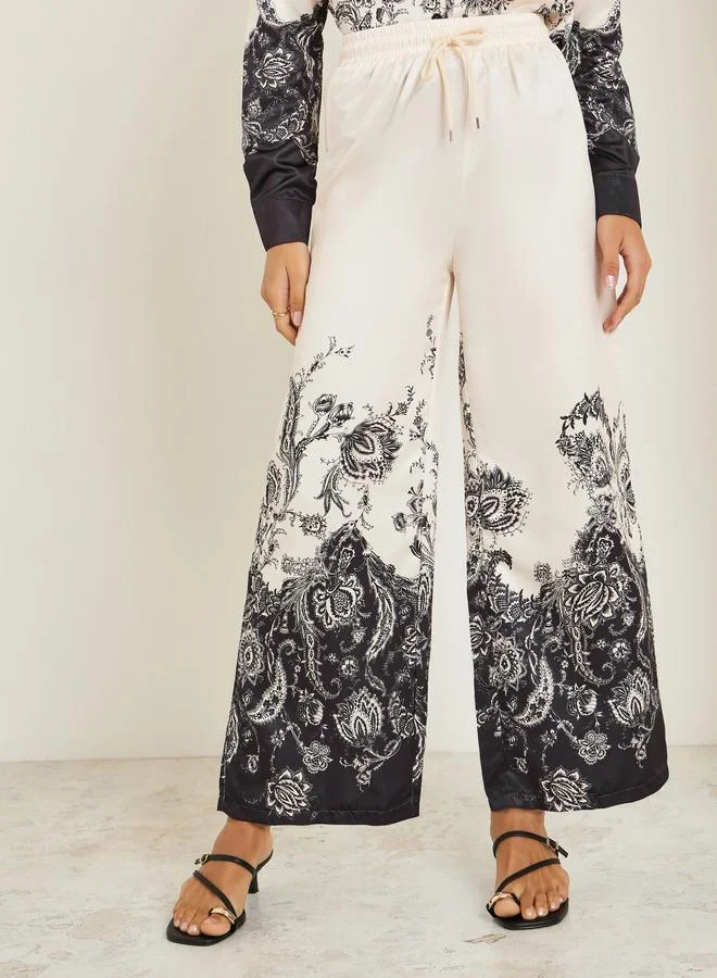 Styli Women Beige Wide Leg Paisley Print Trousers
